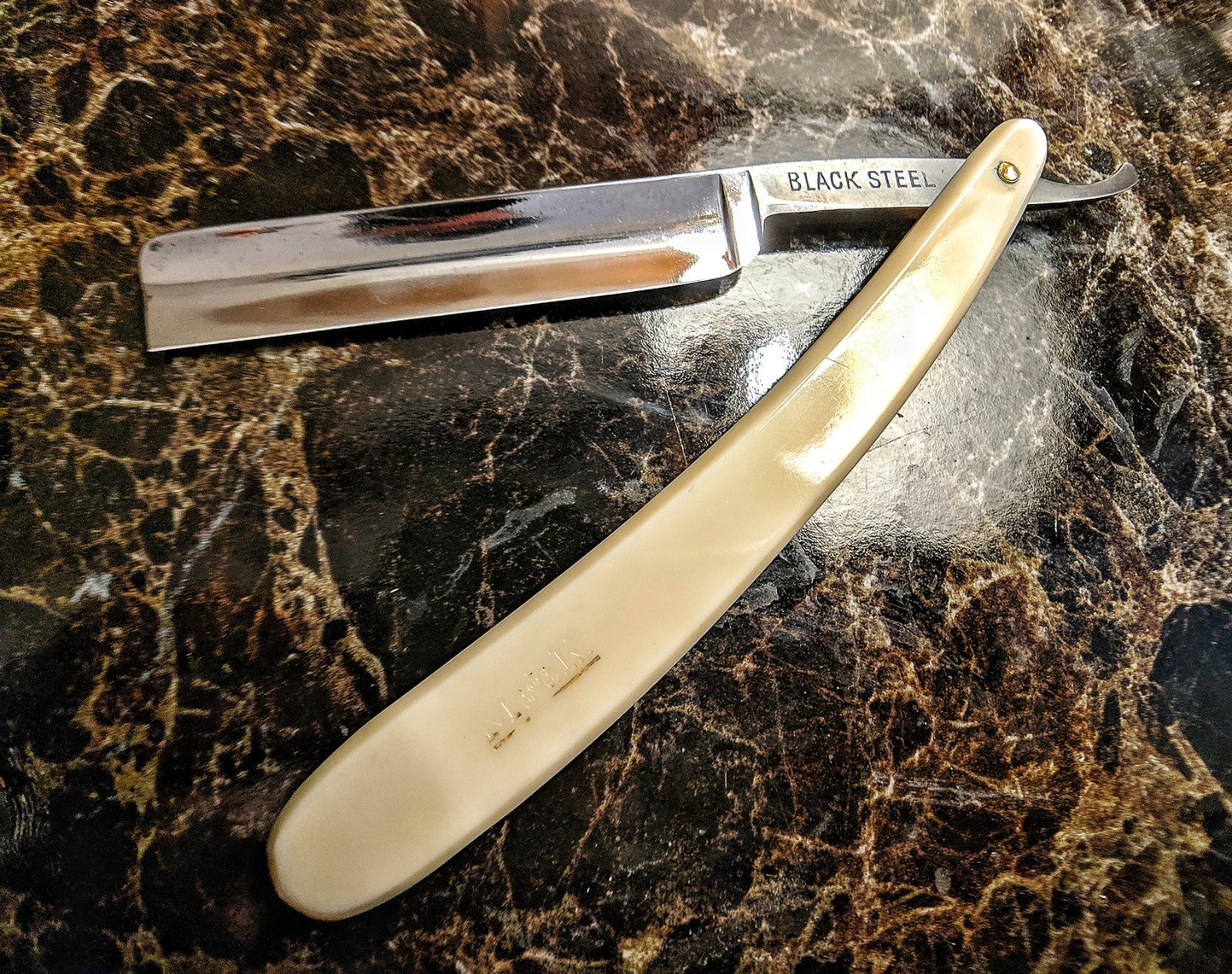 Vintage Black Steel Straight Razor that is 9/16 Made in Germany Shave