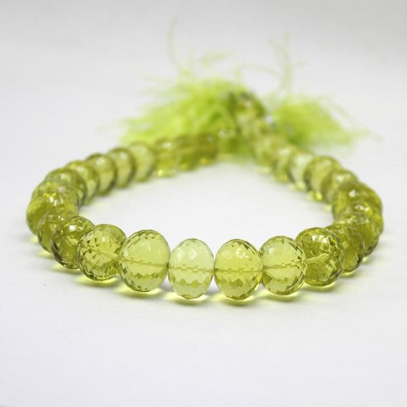 Sold in set of 15 rondelle Lemon quartz faceted oval beads Faceted Twist Twisted Rondelles 12-9 mm Sparkling Lemon Quartz