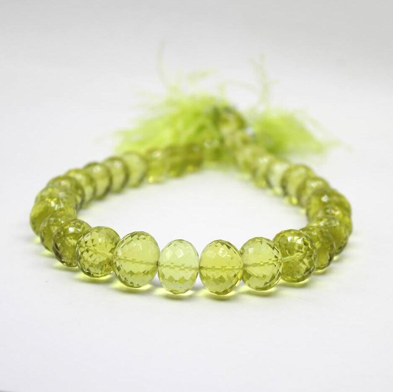 Sold in set of 15 rondelle Lemon quartz faceted oval beads Faceted Twist Twisted Rondelles 12-9 mm Sparkling Lemon Quartz
