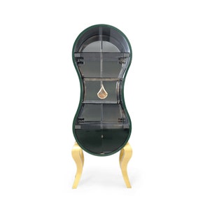 High-end luxury display cabinet in high gloss green with glass doors