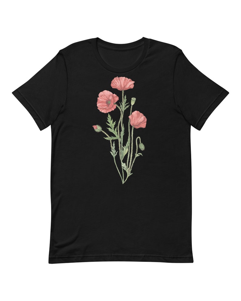May include: Black t-shirt with a floral design featuring pink poppies and green stems.
