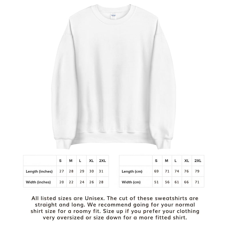 May include: Size chart for unisex sweatshirts in sizes S, M, L, XL, and 2XL. The chart shows measurements in inches and centimeters for length and width. The text below the chart states that the sweatshirts are straight and long, and recommends sizing up for a roomier fit or down for a more fitted shirt.