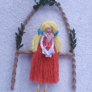Macrame dolls. The girl is reading a book in the garden. A gift for a book lover who wears glasses.Wall decor.Family decoration.