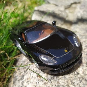 1:36 Porsche Carrera GT.KINSMART.Made in China.Collectible car.Toy for a boy.