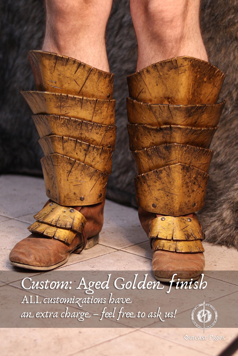 May include: Aged golden finish custom leg armor. The armor is made of layered plates with a distressed finish. The boots are brown leather. The text on the image says "Custom: Aged Golden finish".