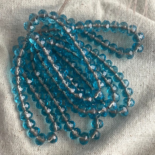 Czech Glass Faceted Rondelle Beads in Aqua with a Silver Core, 8 mm, 1 mm hole, 25 beads per strand