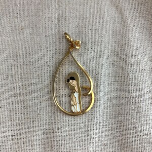 Dag Religious Pendant, Spain, 1 5/8&quot; x 7/8&quot;, 5 mm ring, gold tone base metal, praying woman with enamel detail, vintage, signed
