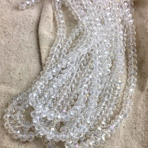 Faceted Crystal Rondelle Beads, 7 mm, 1 mm hole, 15&quot; strand, 72 beads per strand