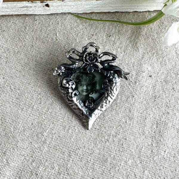 Heart Shaped Picture Frame Brooch, 2" x 1 3/4", antiqued silver tone base metal, plastic front unbranded