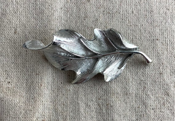 BSK Leaf Brooch, 3" x 1 1/2", silver tone base me… - image 1