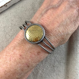Premier Designs Bracelet, extends to 8 1/4&quot; long, 1 1/8&quot; diameter center, two tone, hammered finish, signed on hang tag