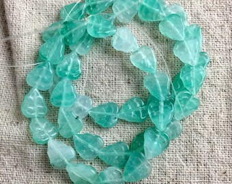 Czech Glass Carved Leaf Beads in Iced Mint, 10 mm x 8 mm, 1 mm hole, 15 beads per strand
