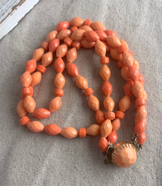 Gold plastic shop bead necklace