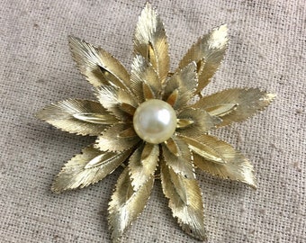 Lisner Vintage Flower Brooch, 1960's, textured gold tone base metal, faux pearl, signed, 2 1/4" in diameter