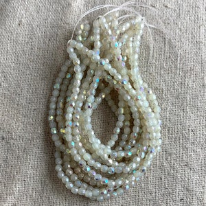 Czech Glass Faceted Round Beads in Ivory with AB and Mercury Finish, 3 mm, 1 mm hole, 50 beads per strand