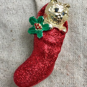 AJC Kitten in a Stocking Brooch, glitter, gold tone base metal, 2 1/2" x  3/4"