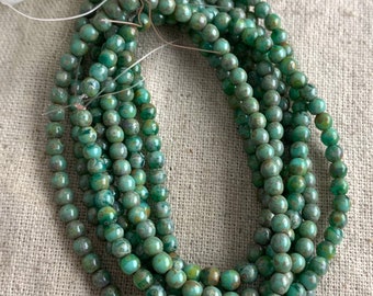 Czech Glass Round Druk Beads in Blue Green with Picasso Finish, 4 mm, 1 mm hole, 50 beads per strand