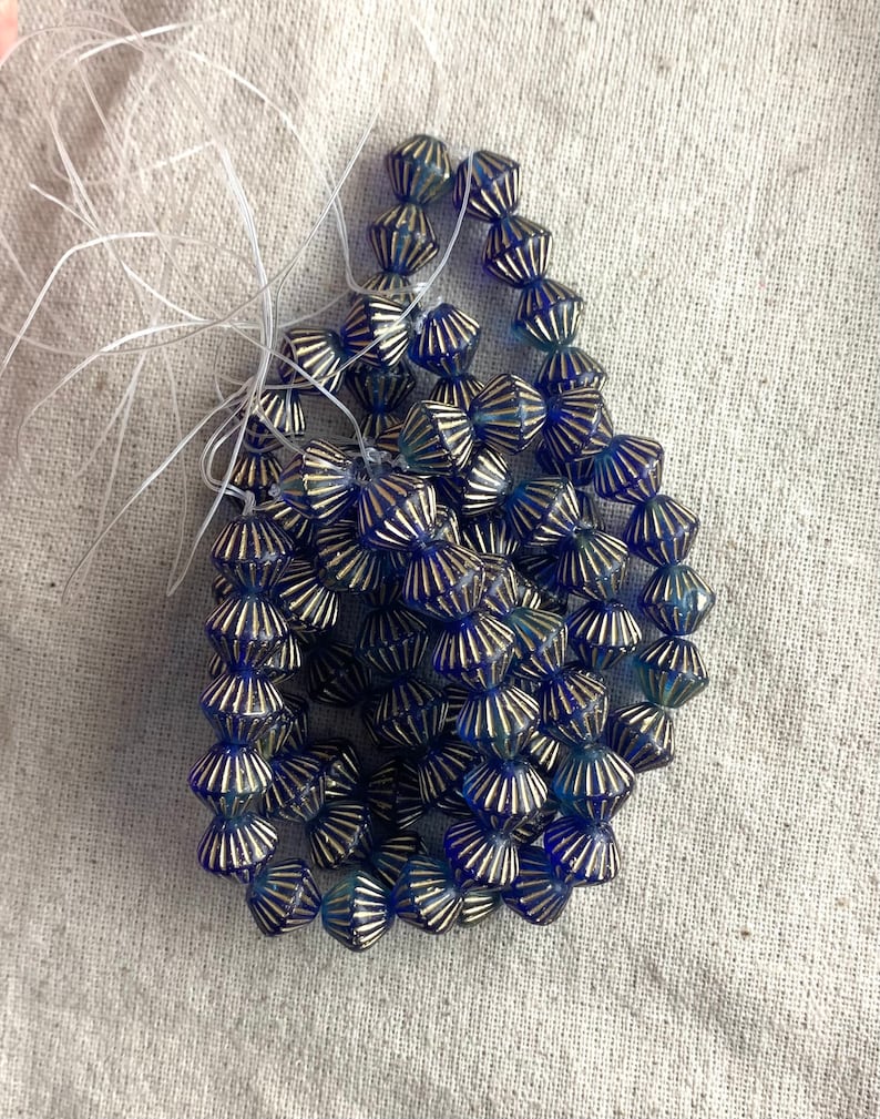 15 beads per strand 1 mm hole 11 mm Czech Glass Tribal Bicones in Sapphire and Sky Blue with Gold