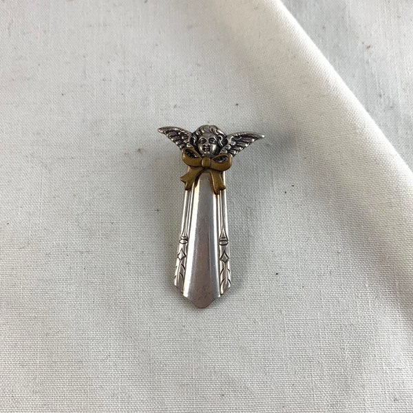 Flatware Angel Brooch, 1 7/8" x 1 1/8", silver tone base metal, bronze accent, vintage, lapel pin, unbranded