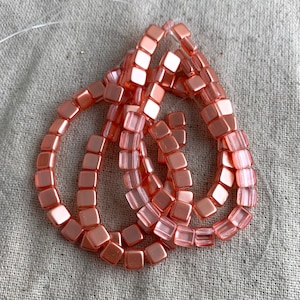 Czech Glass Square Beads in Peach Pearl, 6 mm, TWO 1 mm holes, 25 beads pre strand, one sided