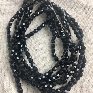 Czech Glass Faceted Round Beads in Fire Polished Black, 4 mm, 1 mm hole, 50 beads per strand