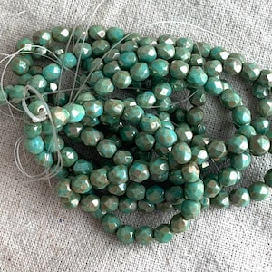 Czech Glass Faceted Round Beads in Sea Green with Picasso and Luster, 6 mm, 1 mm hole, 25 beads per strand