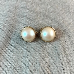 Nina Ricci Faux Pearl Clip on Earrings, 3/4&quot; in diameter, gold tone base metal, vintage, signed