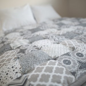 Custom made flannel quilt.  King, queen, double, twin, baby, throw or lap sized.  Handmade, hand-tied  flannel patchwork quilt