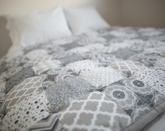 Custom made flannel quilt.  King, queen, double, twin, baby, throw or lap sized.  Handmade, hand-tied  flannel patchwork quilt