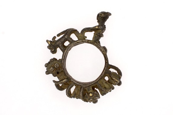 Antique Muria Bastar ritual bronze fertility ring with agrarian figures Madhya Pradesh tribal India