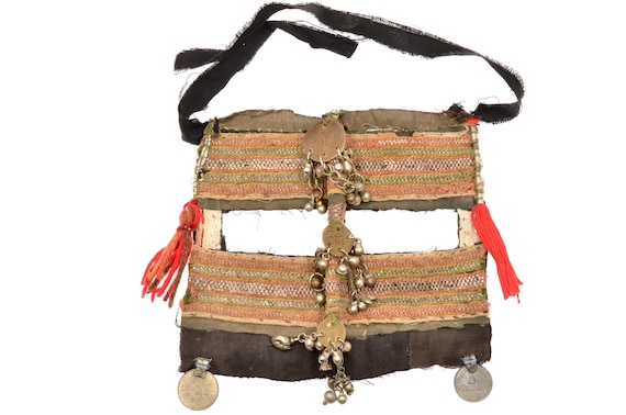 Old Saudi Bedouin face veil with coins and metal ornaments, tribal ceremonial textile from Arabia