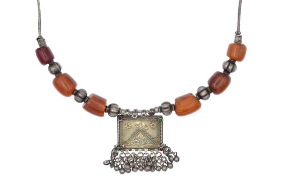 Antique Pakistani tribal silver gilt pendant necklace with bakelite beads bells and glass cabochons Sindh Balochistan ethnic jewelry