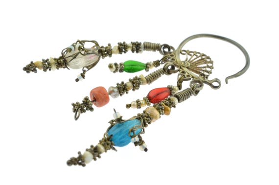 Antique tribal silver Chalka or Khalka earring from Uzbekistan. Ancient ethnic Bukhara silver earring