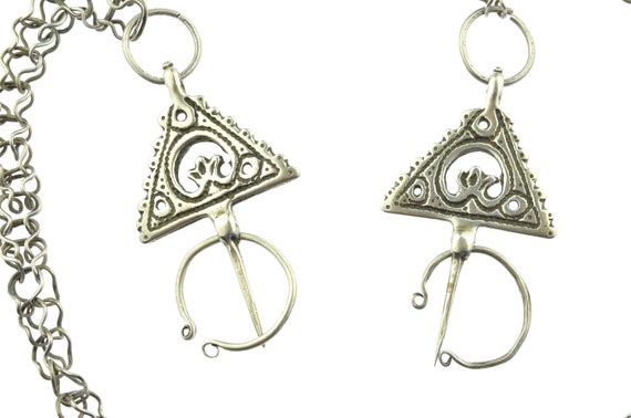 Antique pair of ethnic silver TAZENAGHT fibulae. Old Berber tribal fibulae from Morocco in high grade silver