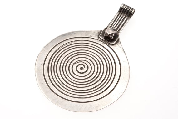 Old Berber silver spiral of life. Large Amazigh high grade silver amulet from Morocco