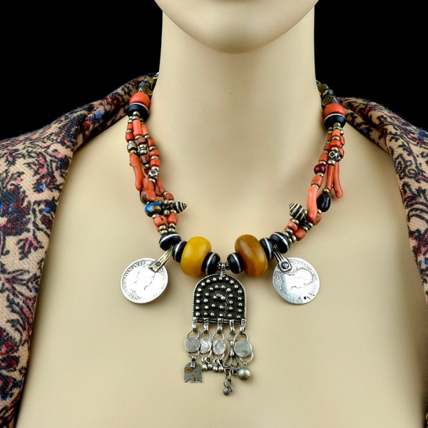 Old ethnic Berber necklace from southern Morocco. Antique tribal necklace in silver, coral, shell, ebony and Kiffa bead