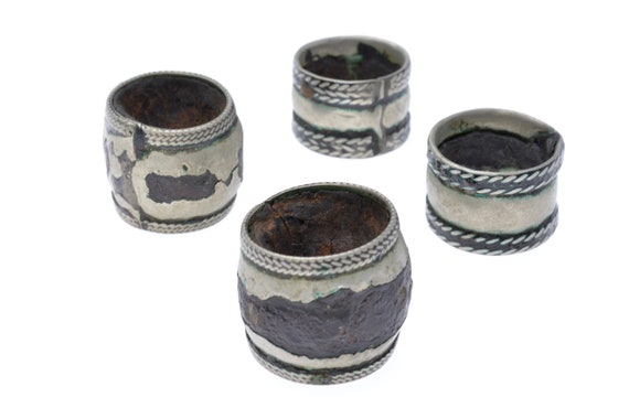 Lot of 4 large old Berber tribal hair rings DWAMEN in silver and leather from Draa Valley in Morocco