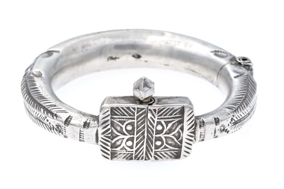 Antique Indian Silver Bracelet: Rigid Design with Hinged Closure, Geometric Engravings and Ornate Relief Motifs, Rajasthan, Gujarat