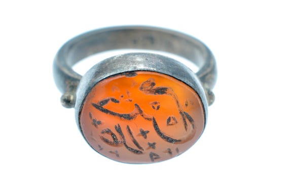 Antique Silver Carnelian Ring with Engraving: Protective Symbolism and Cultural Identity in Islamic Art