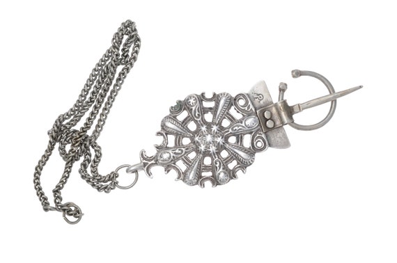 Old molded openwork fibula in silver from northern Morocco. Antique JBALA tribal fibula from Ouezzane.
