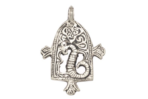 Old ethnic Berber LOUHA amulet in low grade silver. Old Amazigh tribal Gates of Paradise pectoral from the Todrha valley in Morocco