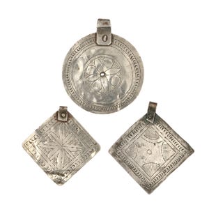 Set of 3 antique Tunisian pendants. Antique Gamra disc from Kernenna Island, Gabes or Sfax in Tunisia.