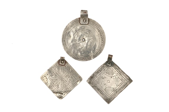 Set of 3 antique Tunisian pendants. Antique Gamra disc from Kernenna Island, Gabes or Sfax in Tunisia.