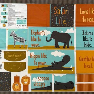 May include: A fabric panel for a children's book titled Safari Life, featuring illustrations of a zebra, elephant, hippo, giraffe, and lion. The panel includes text such as Lions like to roar, Zebras like to hide, and Giraffes like to eat, with instructions for assembly printed on the left side.