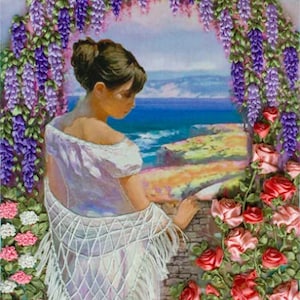 May include: A woman in a white dress with a lace shawl stands under a purple wisteria archway. She is looking out at a seascape with a rocky coastline. The scene is framed by a border of red roses.