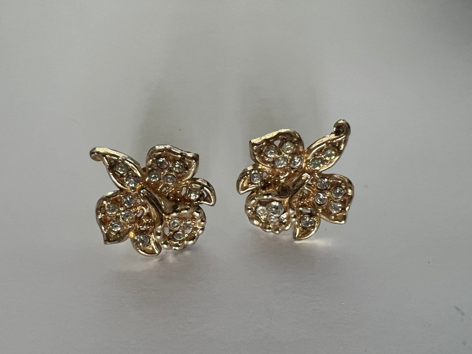 Vintage  Orchid floral Golden tone metal and clear rhinestones Ear Clips Clip on Ear made in USA