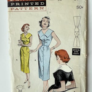 May include: Vintage Butterick printed pattern featuring illustrations of dresses. The cover displays a blue and white gingham dress, a yellow dress, and a black dress with a white collar. The text "Quick and Easy" is also visible.