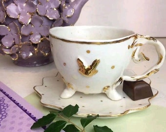 Porcelain tea cup, called "WHITE RABBIT". Entirely modeled and decorated by hand. Available in various colors. Made to order. Made in Italy