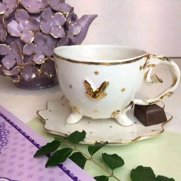 Porcelain tea cup, called "WHITE RABBIT". Entirely modeled and decorated by hand. Available in various colors. Made to order. Made in Italy