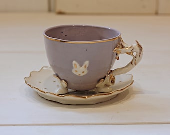 Porcelain tea cups, called "ALICE LILLA". Entirely modeled and decorated by hand. Available in various colors. Made to order. Made in Italy